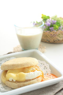 Poached Egg And Cheese In English Muffin Sandwish