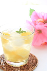 Pineapple sode with flower for tropical drink image
