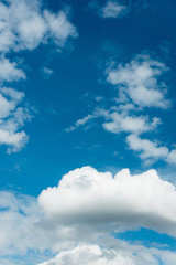 Cloudscape of bright blue sky