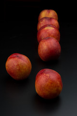 Nectarine friut on black isolated background