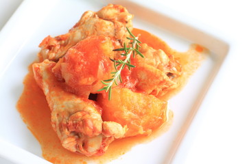 Mediterranean food, simmered chicken and tomato