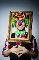 Funny clown with picture frame