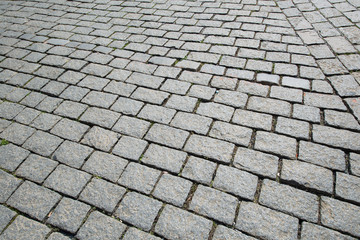 Old road paved with the cobble stones