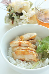 Chinese food, soy sauce chicken on rice with vegetable