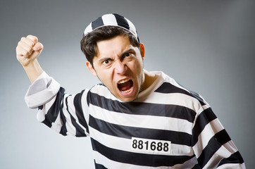 Funny prison inmate in concept