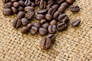 Coffee beans on linen background