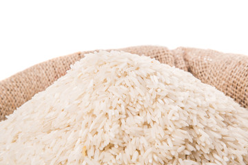 Rice in a gunny sack over white background