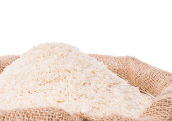 Rice in a gunny sack over white background