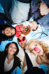 Fototapeta premium Group of happy young people in circle