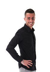 Fototapeta premium Smiling young man in black shirt, looking at camera