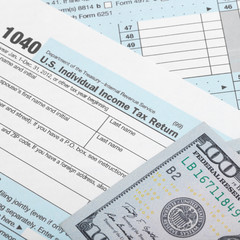 US Tax Form 1040 with two 100 dollars bank - 1 to 1 ratio