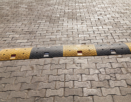 sidewalk, speed limit police on road - Powered by Adobe