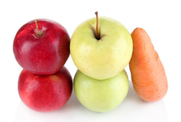 Sweet apples and carrot isolated on white