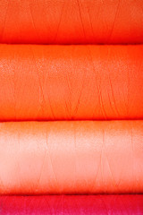Multicolor sewing threads background