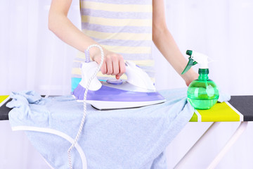 Woman ironing clothes