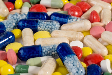 Color pills and capsules background