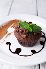 Chocolate muffin with chocolate sauce