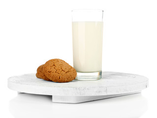 Milk and cookies on wooden tray isolated on white