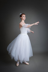 Fototapeta premium ballerina on a grey background
