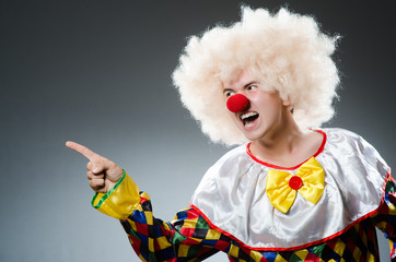 Funny clown in the studio