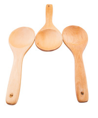 Wooden spoon over white background