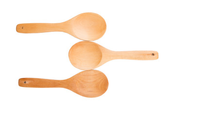 Wooden spoon over white background