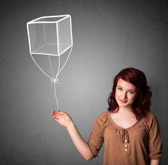 Woman holding a cube balloon