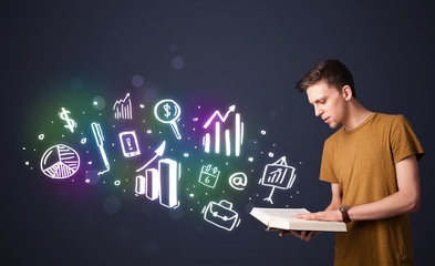 Young guy reading a book with business icons