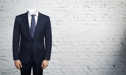 man in suit without head