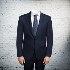 man in suit without head