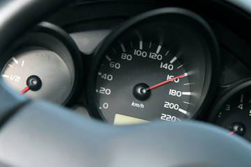 dashboard of car going fast. high speed concept