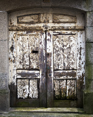 Old doorward, weathered and rotting in Porto