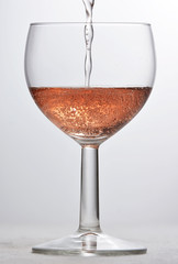 wine glass with red sparkling drink