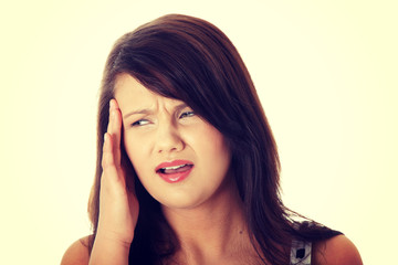 Fototapeta premium Young woman with headache