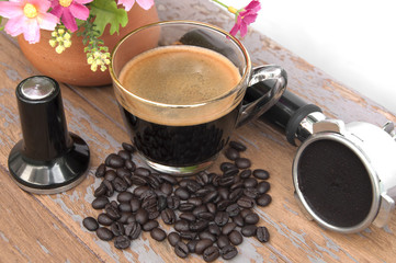 Hot coffee and coffee making equipment with flower clay pot.