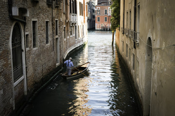 Man on a boat in Venice