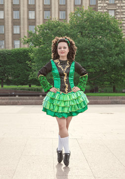 Young woman in irish dance dress posing