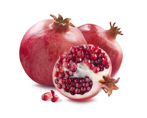 Whole pomegranates and half slice isolated on white background
