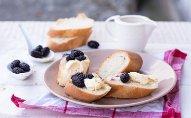 French breakfast in the garden, snack on baguette