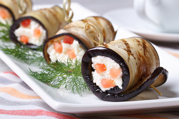 Eggplant rolls stuffed with cream cheese and tomatoes