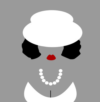 woman dressed up for celebration wearing hat and pearls