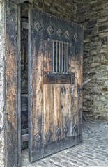 Wooden Door with Iron Bars