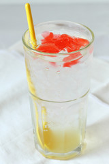 glass of lime soda drinks with red jelly