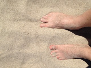 feet on the beach