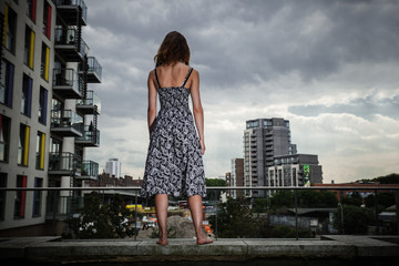 Young woman looking at city