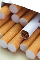Cigarettes with a brown filter close - up