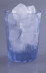 Glass with ice cubes