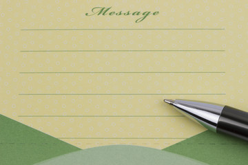 Message sticky note and pen