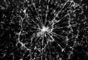 Background of black broken glass in cracks