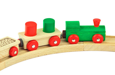 Wooden toy colored train isolated on white background